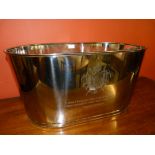 A white metal champagne cooler, the sides engraved with Napoleon Bonaparte and Lily Bollinger