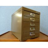 A small steel Bisley filing cabinet