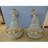 A pair of large French Empire style bag shaped chandeliers