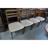 A set of four Nathan teak dining chairs