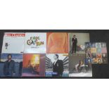 Six Eric Clapton LP records and three Who related LP records
