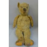 A 1930's Teddy bear with jointed limbs, 50cm