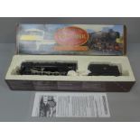 A Hornby R864 BR 2-10-0 Class 9F 00 gauge model locomotive and tender, boxed