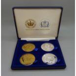 A Queen Elizabeth II Gold and Silver Jubilee Limited Edition commemorative four coin set, cased