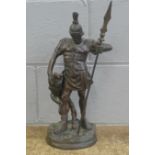 A bronze figure of a Roman Centurion and lion, 42cm