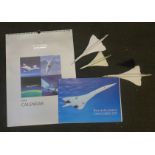 A Concorde calendar and three models including Corgi