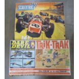 A Scalextric set and 'Daredevil' Trik-Trak set