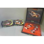 A Scalextric Classic Grand Prix set and two Grand Prix cars, boxed