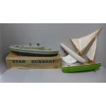 A boxed Star clockwork gunboat, a Star speedboat and a Star yacht