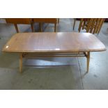 An Ercol Blonde elm and beech Windsor coffee table