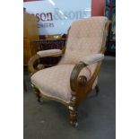 A Victorian mahogany and fabric upholstered open armchair