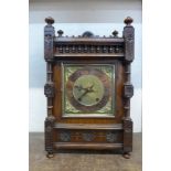 A 19th Century W&H. Sch carved oak bracket clock