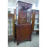 A mahogany display cabinet