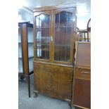 A burr walnut display cabinet