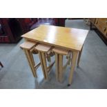 A Danish Poul Hundevad teak nest of tables