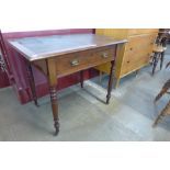 A Victorian James Shoolbred & Co. mahogany single drawer writing table