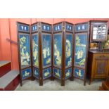 A Chinese mahogany and blue chinoiserie decorated six panel folding screen