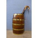 A coopered oak barrel stick stand and sticks