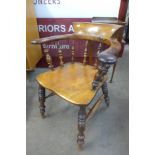 A Victorian yew wood smokers bow chair