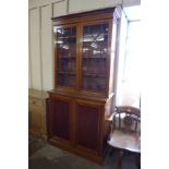 An Edward VII inlaid mahogany bookcase