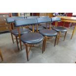 A set of six G-Plan Fresco teak and black vinyl dining chairs