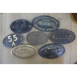 Seven cast iron locomotive plaques