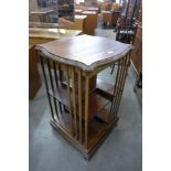 An Edward VII inlaid mahogany revolving bookcase