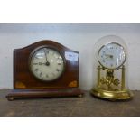 An early 20th Century inlaid mahogany timepiece and an anniversary clock