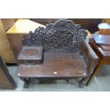 A Burmese carved hardwood bench