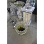 Two concrete garden urns and a cherub on stand