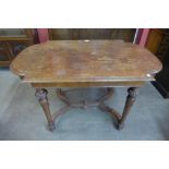 A19th Century French walnut bow end library table