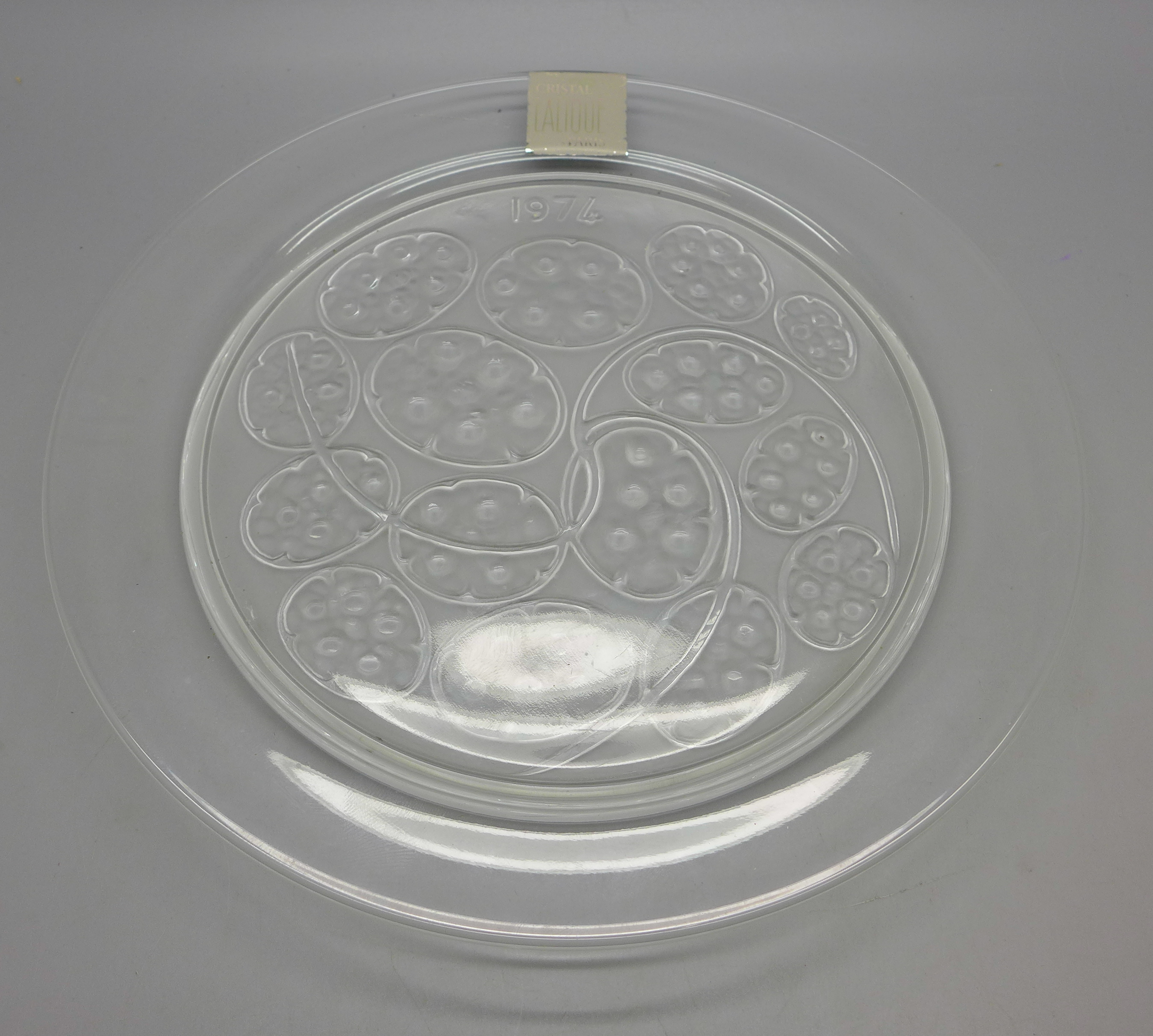 A Lalique glass plate dated 1974, 21cm