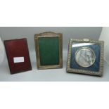 Three silver photograph frames