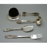 A silver mounted pen wipe, an 830 silver Norwegian Mylius fork, a small ladle, etc.