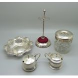 A jewellery stand, a Victorian pierced silver dish, a silver topped glass hair tidy and two silver