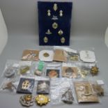 Twenty assorted Regimental cap badges and a board of miniatures