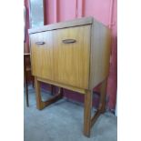 A teak music cabinet