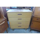 A teak chest of drawers