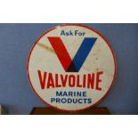 A metal double sided circular Valvoline Marine products advertising sign