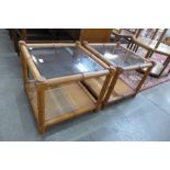 A pair of G-plan faux bamboo and glass topped occasional tables