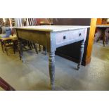 A Victorian pine two drawer kitchen table