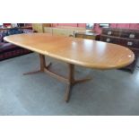 A Danish Gudme Mobelfabrik teak extending dining table