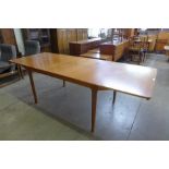 A McIntosh teak T3 extending dining table