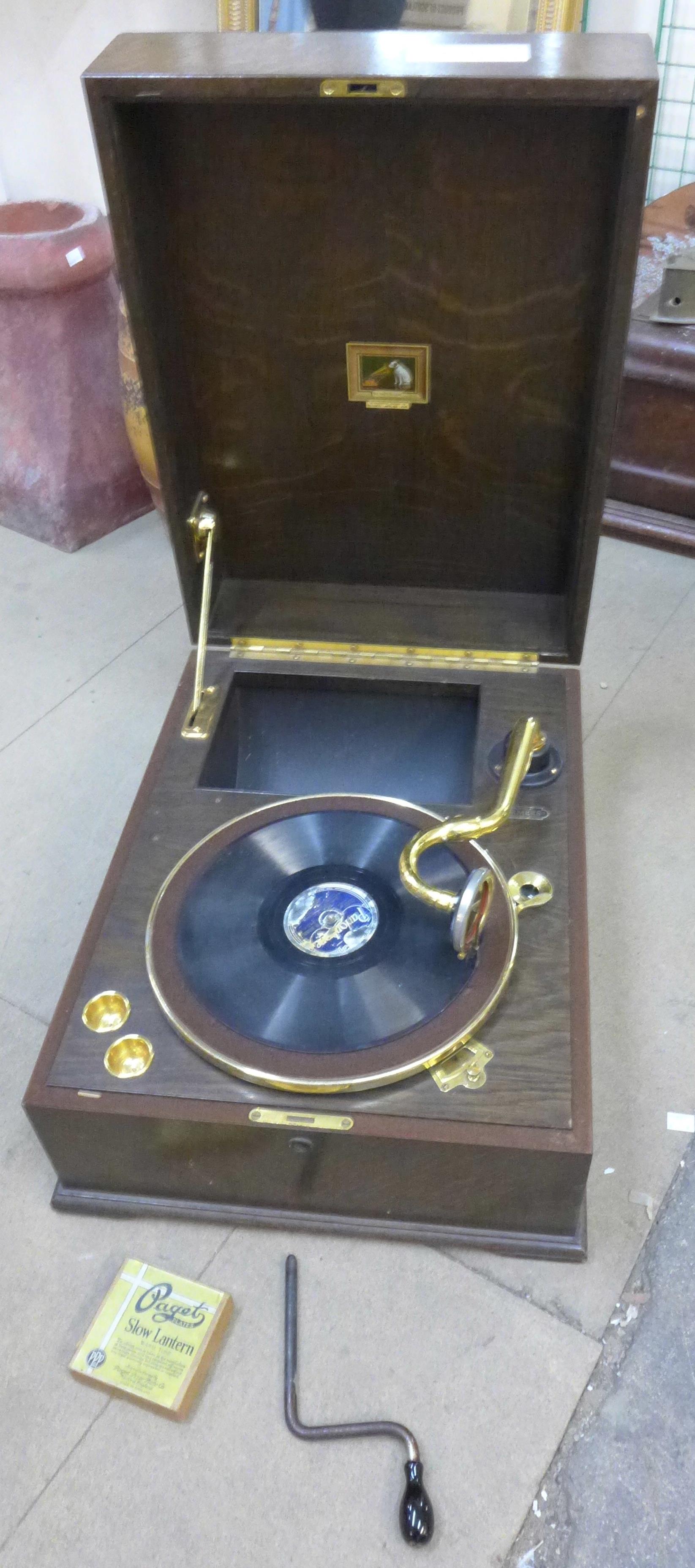 An HMV Farmers gramophone in wooden case with brass fittings