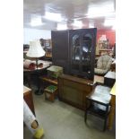 An oak freestanding corner cabinet, a standard lamp, small bookcase, etc. (4)