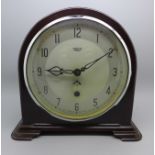A Smiths Enfield Bakelite clock, with broad arrow
