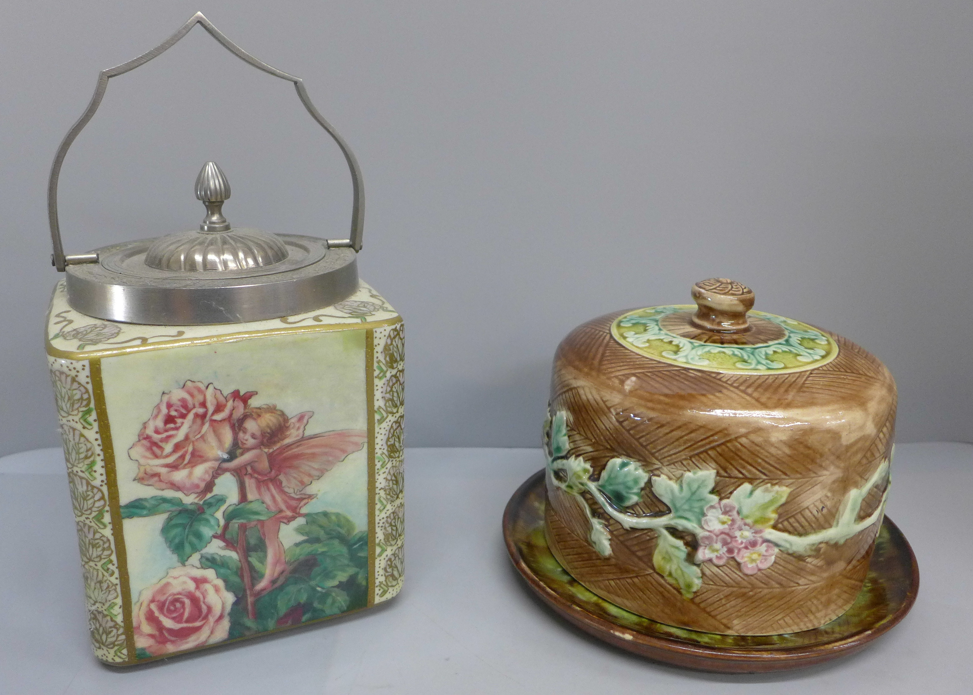 A Majolica cheese dome and a Carlton Fantasia ware biscuit barrel