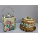A Majolica cheese dome and a Carlton Fantasia ware biscuit barrel
