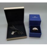 A Links of London charm and a Swarovski ring, K, boxed