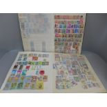 Two albums of stamps; Hong Kong, Grenada, Malawi, Mauritius, Norfolk Islands, etc.